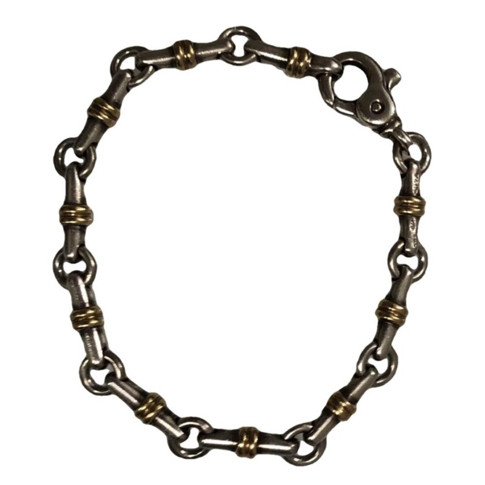 SOLD Tiffany & Co. 18 Karat Yellow Gold and Silver Bracelet. Vintage.